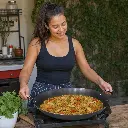 Paellera Aceinox De Acero Carbono 40Cm Eurochef - Opción 2 Uso Beneficio Mujer Latina.webp